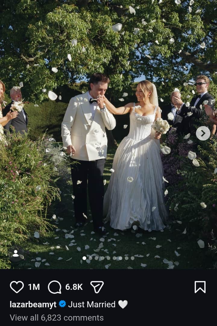 LazarBeam, is pictured with his wife, Ilsa Watkins, on their wedding day, back in March 2026. 